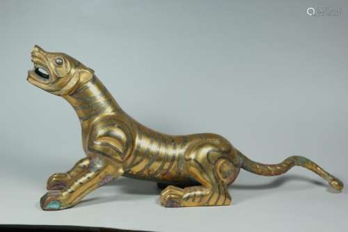 A GILT-BRONZE BEAST.ANTIQUE