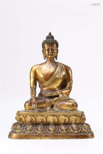 A GILT-BRONZE FIGURE OF SAKYAMUNI.QING DYNASTY