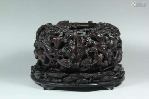 A CARVED AGALLOCH WOOD 'DRAGON' WASHER.ANTIQUE