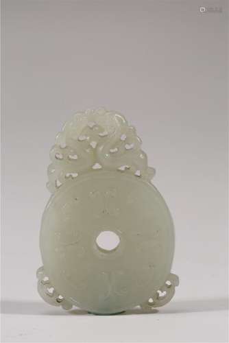 A CARVED WHITE JADE DRAGON PENDANT.ANTIQUE