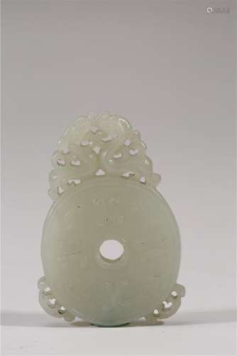 A CARVED WHITE JADE DRAGON PENDANT.ANTIQUE