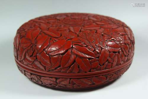 A CARVED CINNABAR RED LACQUER BOX AND COVER.ANTIQUE