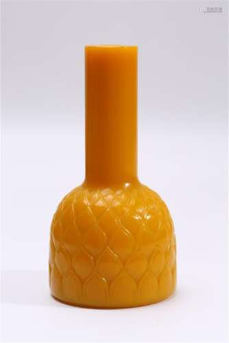 A CARVED YELLOW-GLASS VASE.MARK OF QIANLONG