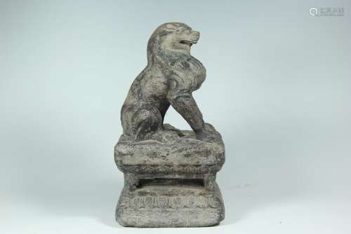 A CARVED STONE LION.ANTIQUE