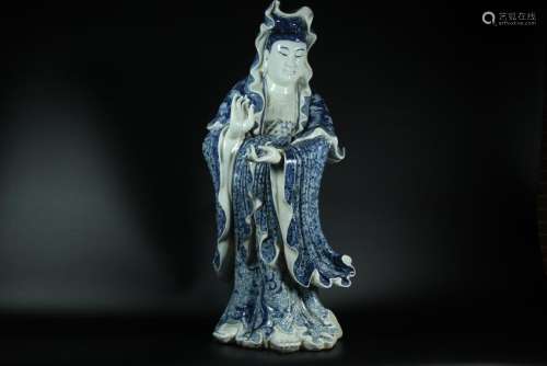 A CARVED BLUE AND WHITE GUANYIN.ANTIQUE