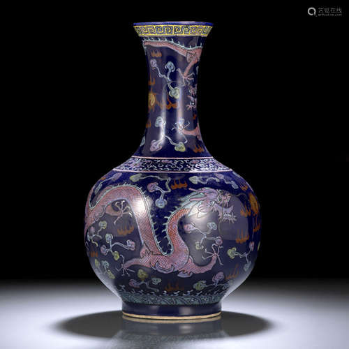 A POWDER-BLUE-GROUND FAMILLE ROSE DRAGON BOTTLE VASE