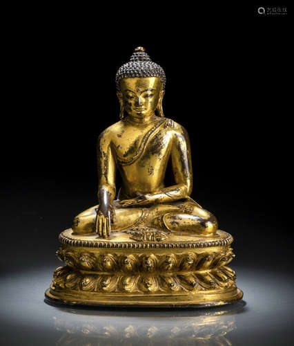 A FINE GILT-BRONZE FIGURE OF BUDDHA AKSHOBYA