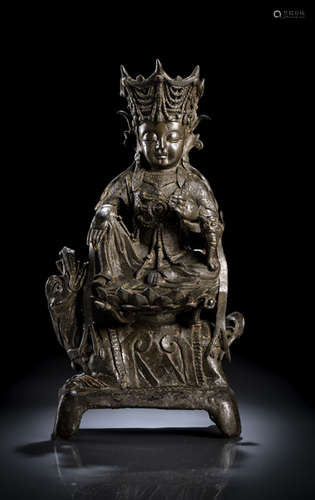 A BRONZE FIGURE OF GUANYIN