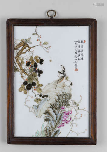 A GROUP OF FOUR PAINTED PORCELAIN PANELS IN WOODEN FRAMES