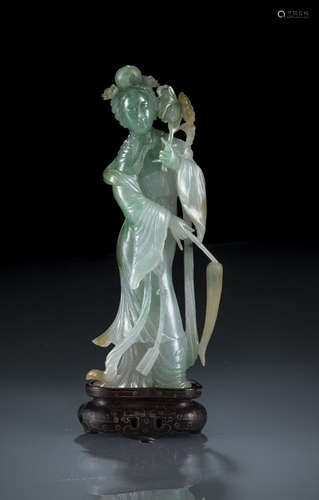 A FINE CARVED JADEITE MODEL OF A MEIREN WITH PEACH BRANCH