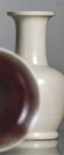 A CREAM-COLOURED CRACKLE-GLAZED VASE