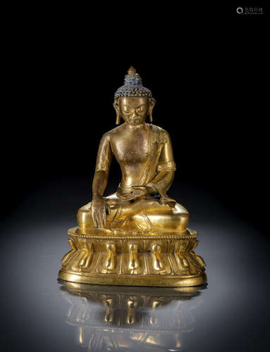 A GILT-BRONZE FIGURE OF BUDDHA SHAKYAMUNI