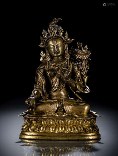 A GILT-BRONZE FIGURE OF SITATARA