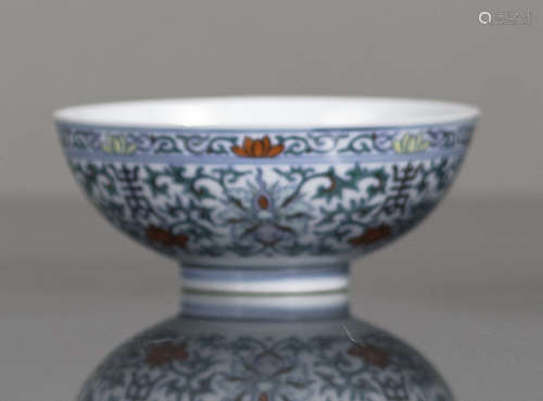 A FINE DOUCAI LOTUS AND SHOU BOWL