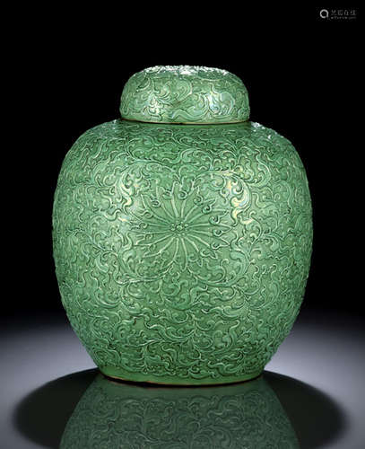 A RARE MOLDED EMERALD-GREEN GLAZED JAR AND COVER