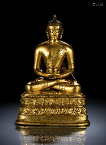 A GILT-BRONZE FIGURE OF BUDDHA SHAKYAMUNI