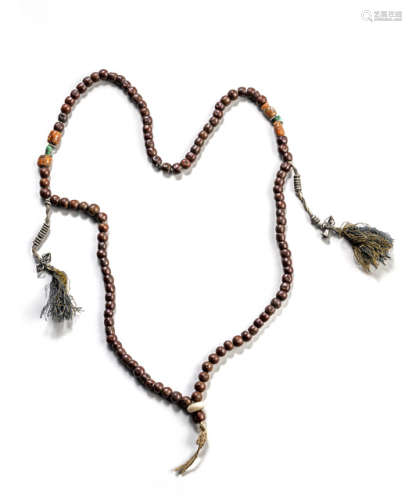 A FRUIT KERNEL MALA WITH IVORY AND CORAL BEADS