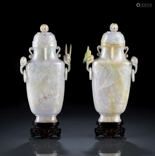 A PAIR OF CARVED JADEITE VASES AND COVERS WITH BUTTERFLY RING HANDLES