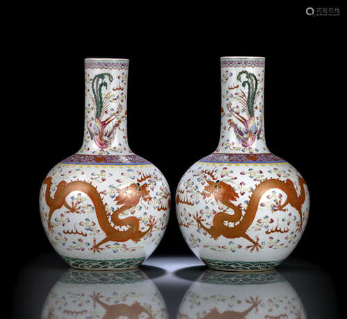 A PAIR OF FAMILLE ROSE DRAGON VASES