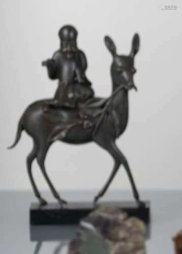 A TWO-PART CENSER IN FORM OF SHOULAO RIDING ON A DEER