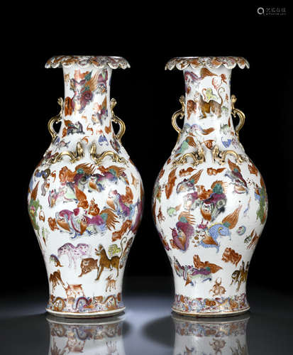 A RARE AND UNUSUAL PAIR OF FAMILLE ROSE PORCELAIN ANIMAL VASES