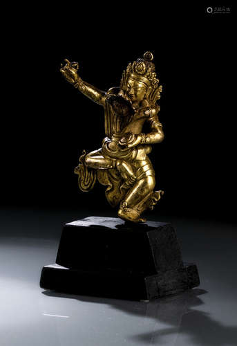 A GILT-BRONZE FIGURE OF A TANTRIC DEITY