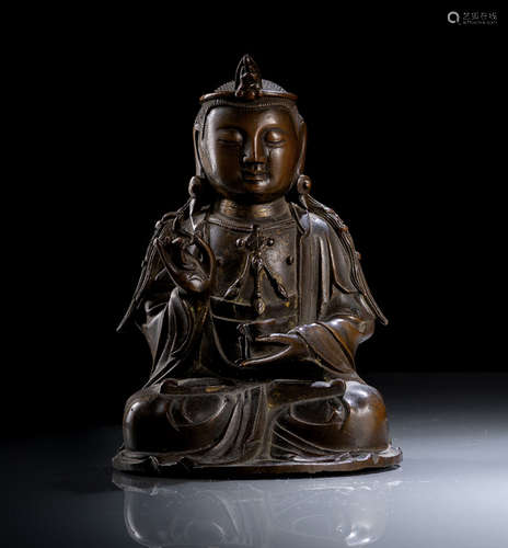 A BRONZE FIGURE OF A GUANYIN