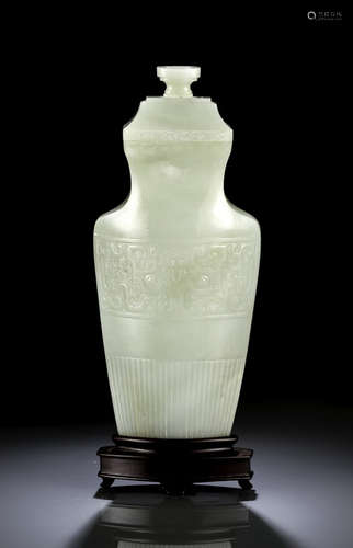 A LIGHT CELADON JADE VASE AND COVER WITH TAOTIE