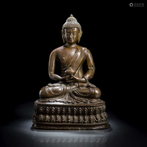 A BRONZE FIGURE OF BUDDHA SHAKYAMUNI