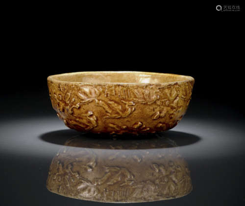 AN UNUSUAL AMBER- AND GOLD-COLORED GLAZED MOLDED ANIMAL BOWL