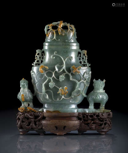 A FINE CARVED CELADON JADE GROUP WITH VASE AND COVER