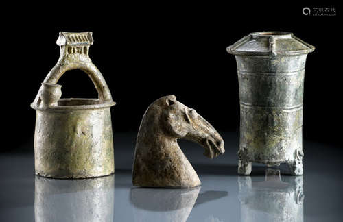 A GREEN-GLAZED POTTERY MODEL OF A WELL AND A GRANARY AND A COLD PAINTED EARTHENWARE MODEL OF A HORSE HEAD