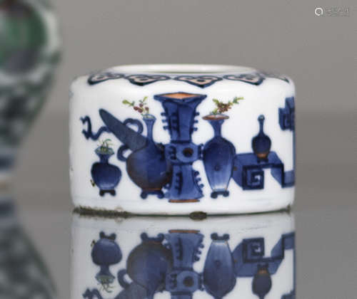 A BLUE AND WHITE AND ENAMELLED PORCELAIN BRUSHWASHER WITH ANTIQUES