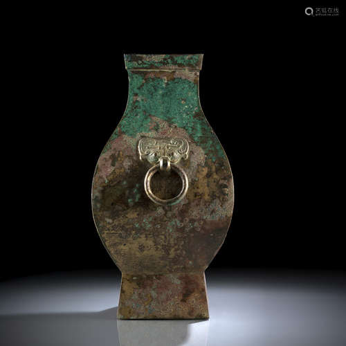 A BRONZE VASE AND COVER