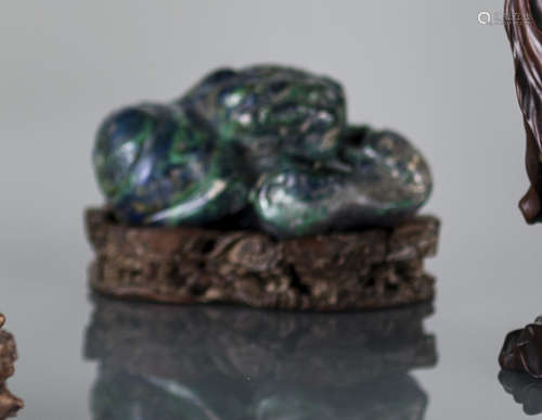 A LAPISLAZULI PAPER WEIGHT IN SHAPE OF A LION AND ITS YOUTH