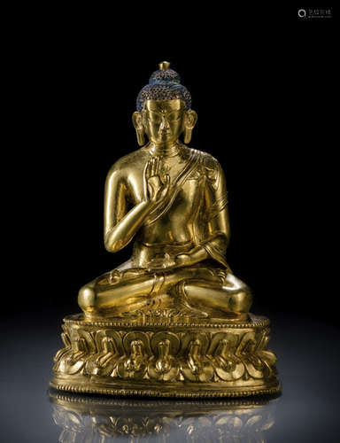 A GILT-BRONZE FIGURE OF BUDDHA SHAKYAMUNI