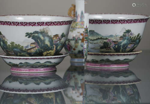 A PAIR OF POLYCHROME LANDSCAPE CACHEPOTS WITH SAUCERS