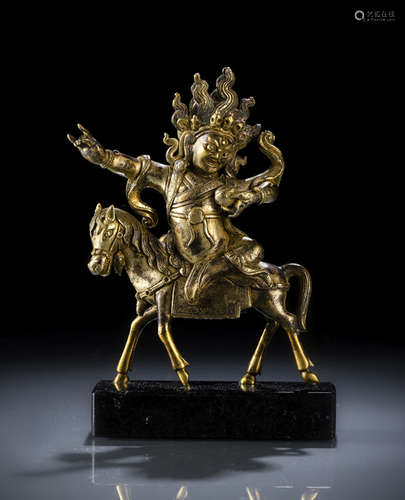 A GILT-BRONZE FIGURE OF SHRI DEVI