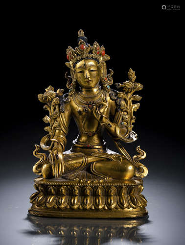 A GILT-BRONZE FIGURE OF SITATARA