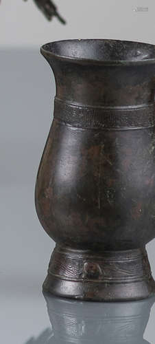 A SMALL BRONZE VASE WITH ARCHAISTIC DECOR BANDS