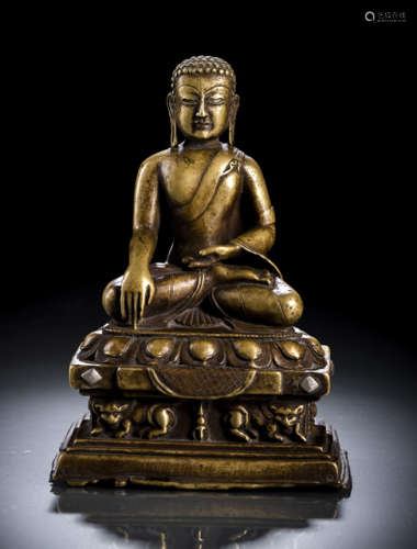 A SILVER- AND COPPER-INLAID BRONZE FIGURE OF PROBABLY A JAIN TIRTHANKARA