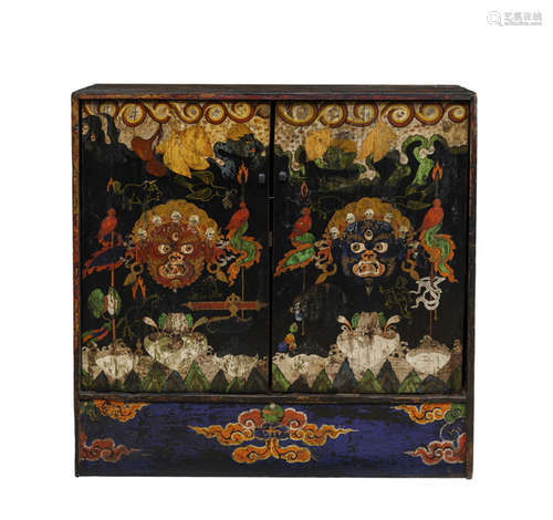 A POLYCHROME PAINTED BLACK-GROUND TORMA CABINET