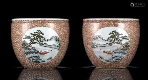 A PAIR OF PORCELAIN CACHEPOTS WITH LANDSCAPE MEDALLIONS ON RED-SPOTTED GROUND