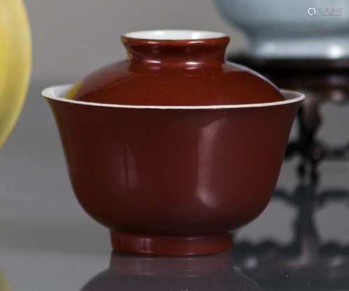 A COPPER-RED GLAZED PORCELAIN BOWL AND COVER