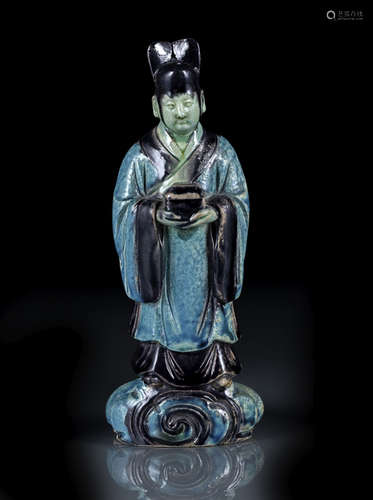 A FAHUA FIGURE OF A STANDING DAOIST OFFICIAL