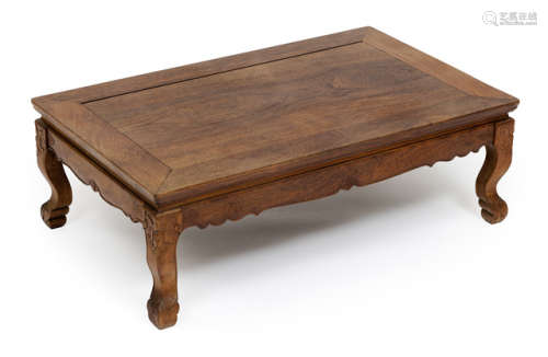 A LOW HARDWOOD TABLE