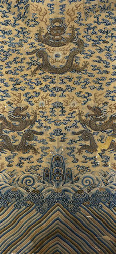 THREE FINELY EMBROIDERED FRAGMENTS OF AN IMPERIAL YELLOW KESI DRAGON ROBE