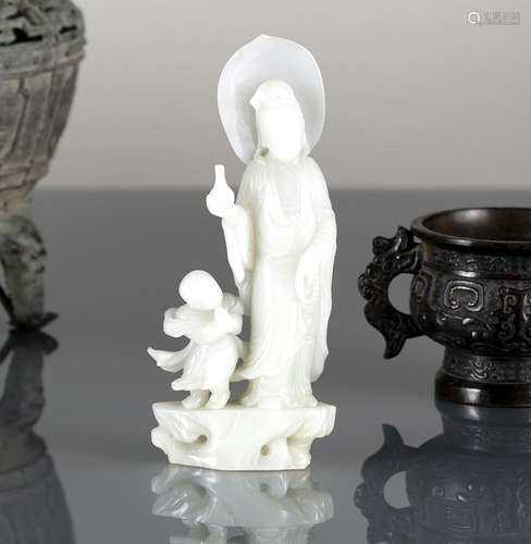 A JADE GUANYIN WITH CHILD