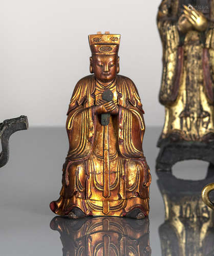 A GILT-LACQUERED WOOD FIGURE OF A SEATED DAOIST OFFICIAL