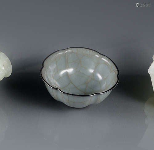 A GUAN-GLAZED BLOSSOM-SHAPED CUP WITH MOUNTED SILVER RIM